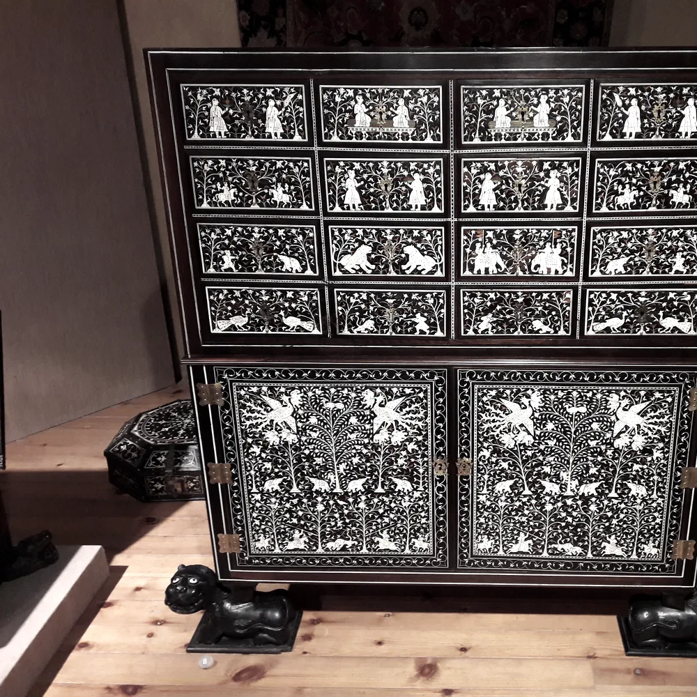 A carved and inlaid ebony 'Sindh work' cabinet
